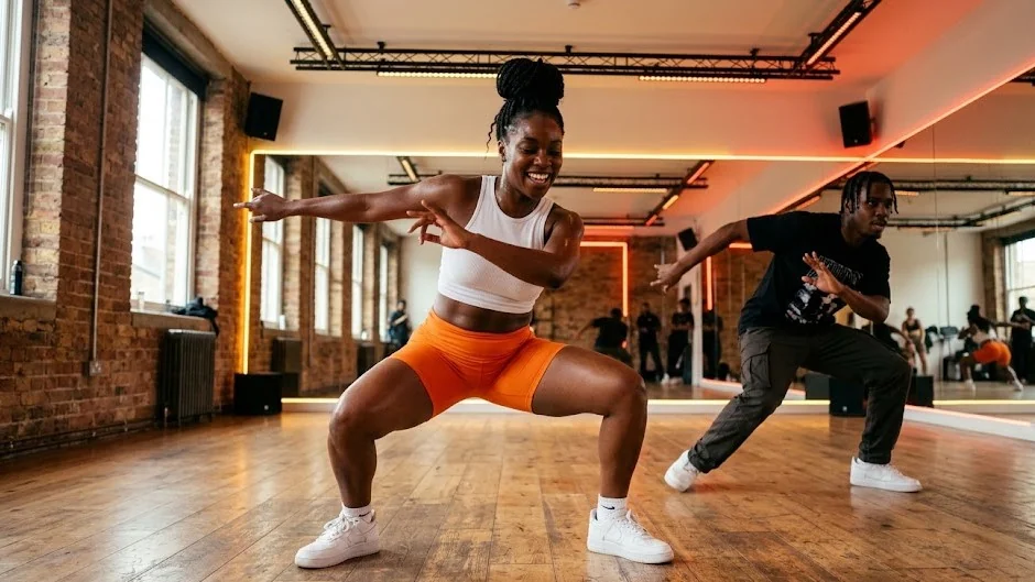 Dancers performing Dancehall moves in a London dance studio
