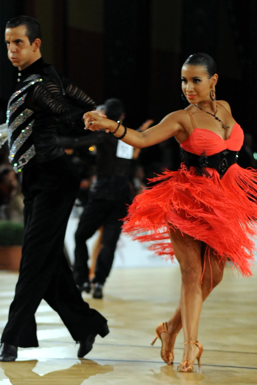 Competitors dancing cha-cha-cha at the WDSF World Dancesport Championships