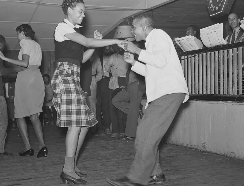 Historic 1939 photograph of jitterbugging in a juke joint in Memphis, Tennessee, from the American roots jive was later codified from