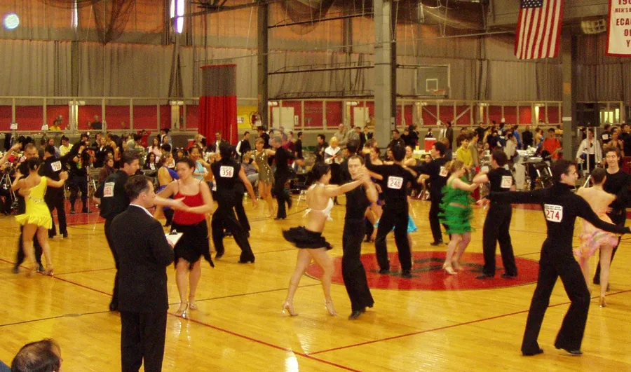 Intermediate-level International Latin dancing at a ballroom dance competition