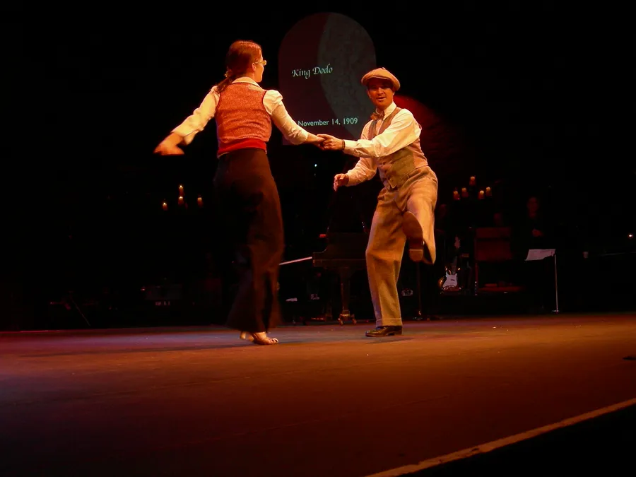 A couple swing dancing
