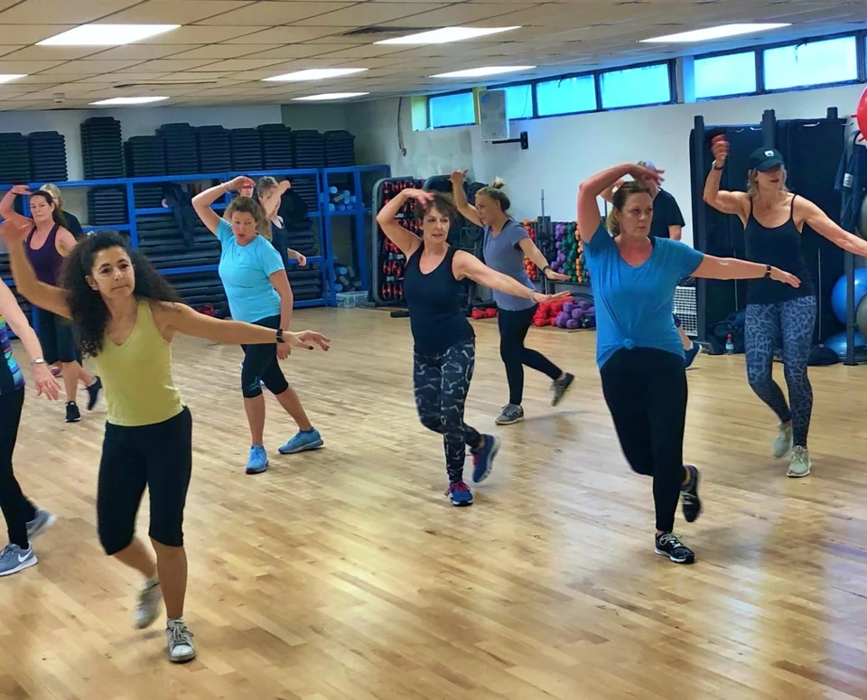 Group of women dancing in a studio
