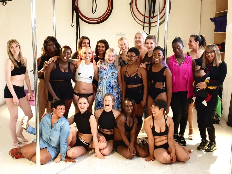 Group of women posing in a dance studio