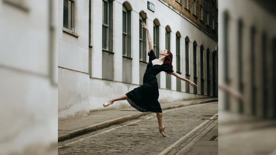 Dancer performing in a street setting