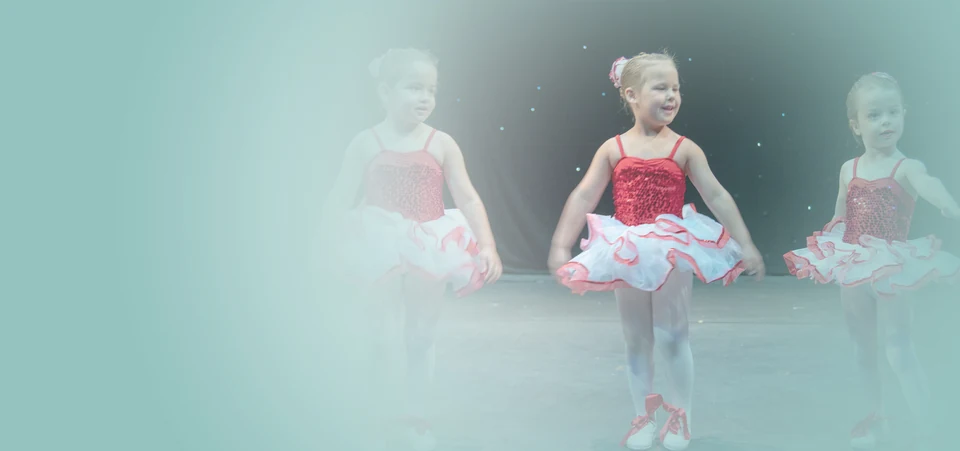 Young ballet dancer performing on stage