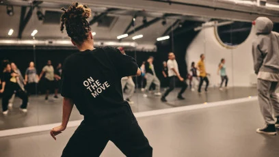Group dance class in a studio setting