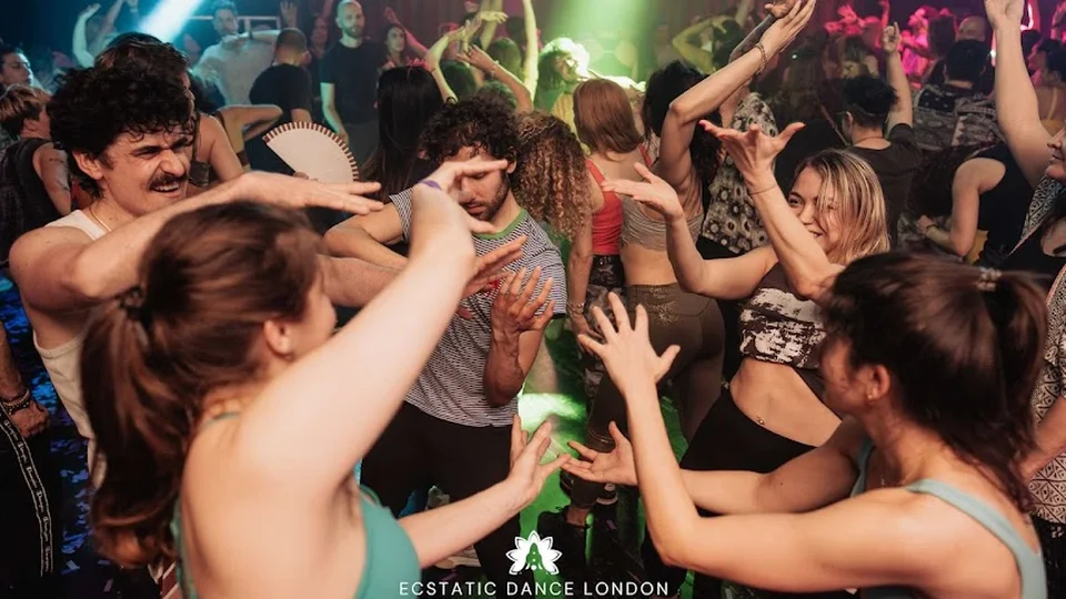 Group of people dancing at a lively event