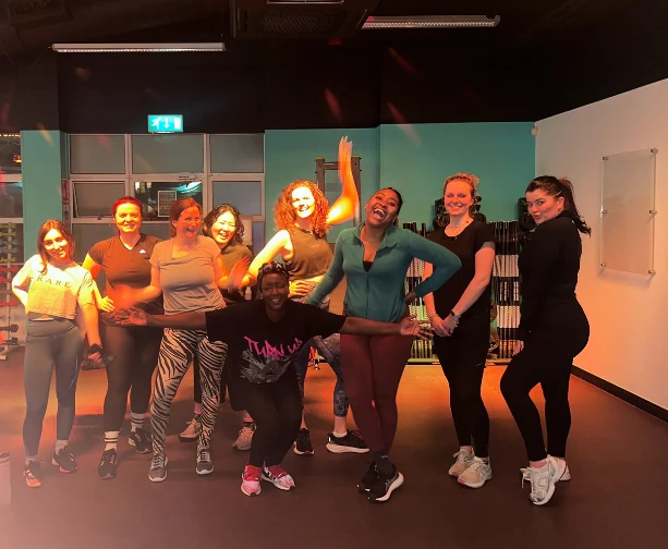 Group of women dancing in a studio setting