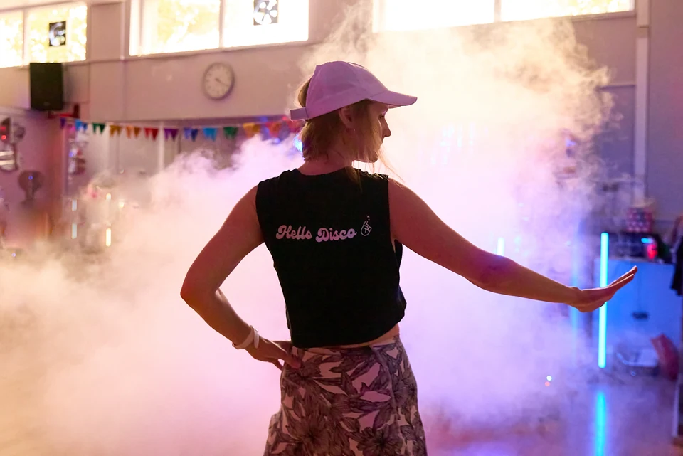 Woman dancing in a studio with fog effects