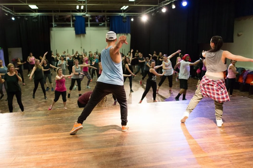 Group dance class in a studio setting