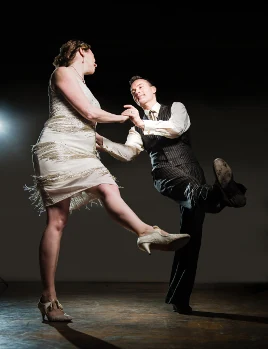 Couple dancing in formal attire