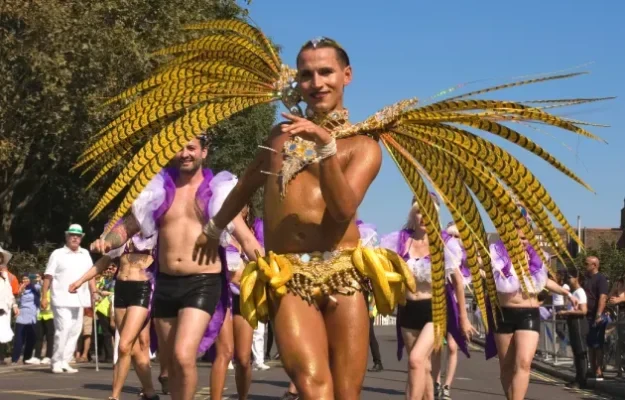 Samba dancers in colorful costumes at a parade
