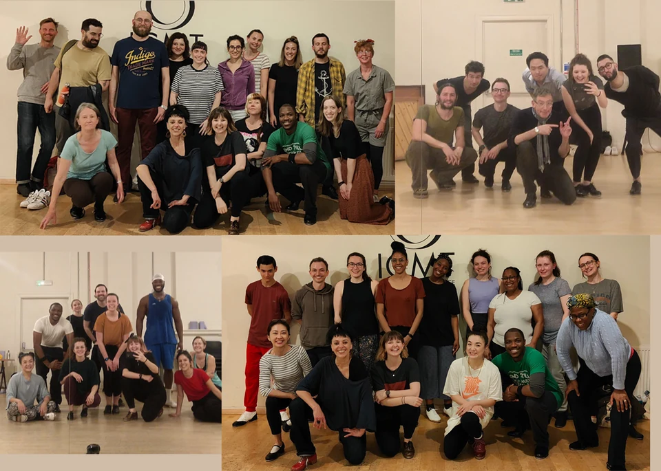 Group of dancers posing in a studio setting