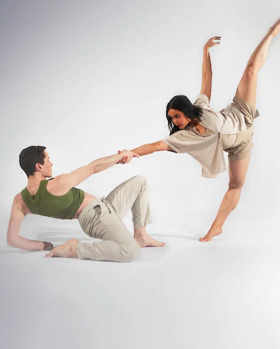 Two dancers performing a contemporary dance duet