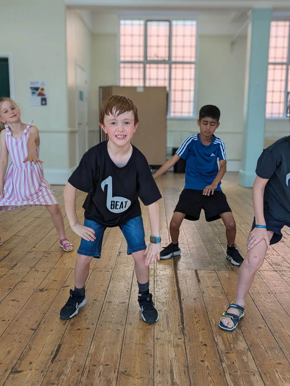 Children dancing in a studio setting