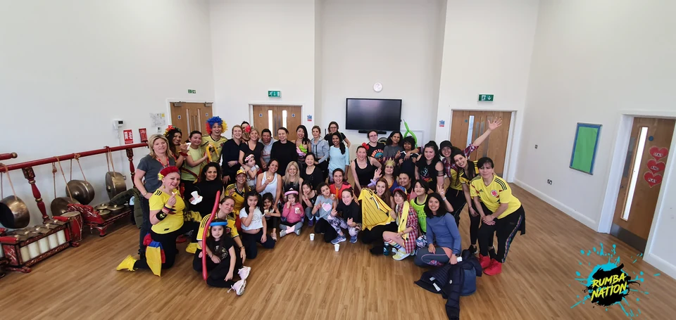 Group of people in a dance studio setting