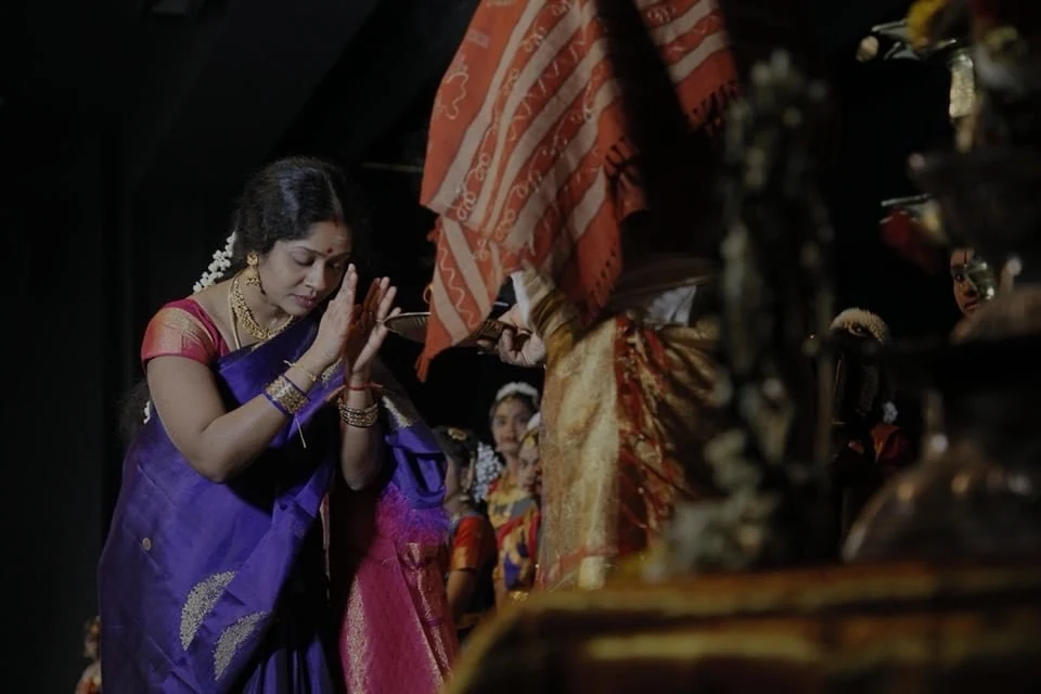 Bharatanatyam dancer performing in traditional attire
