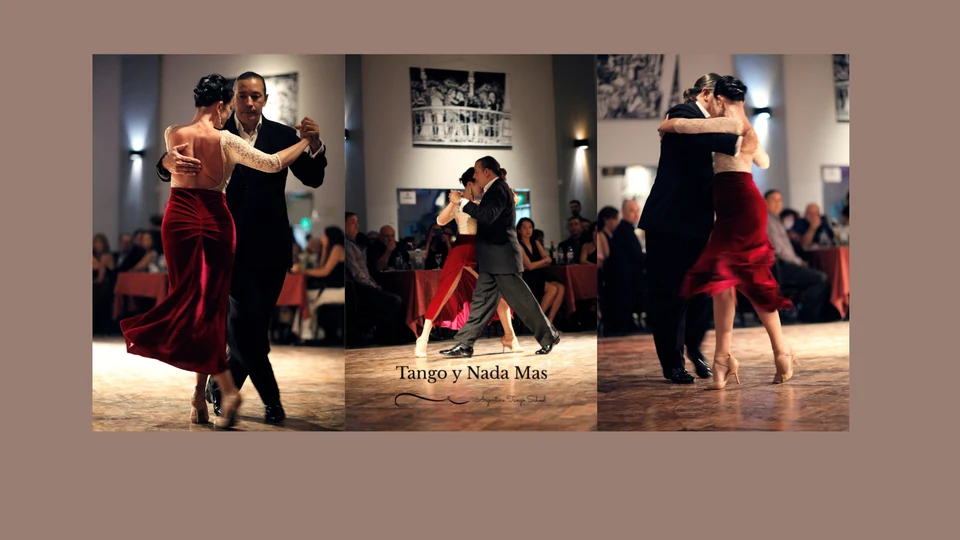Couples dancing Argentine Tango in a ballroom setting.