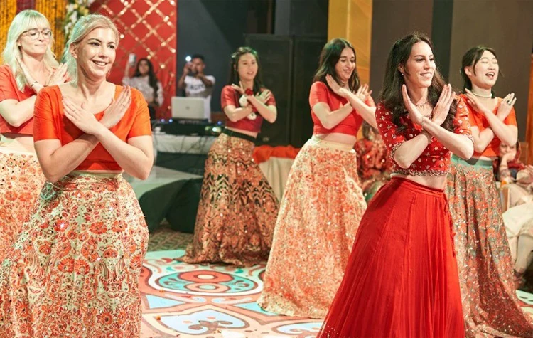 Group of dancers performing in traditional attire
