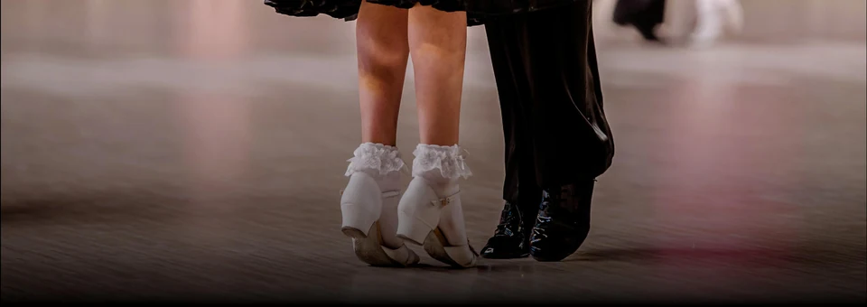 Couple dancing in formal dance shoes