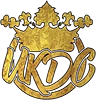 Gold logo with crown and letters UKDC